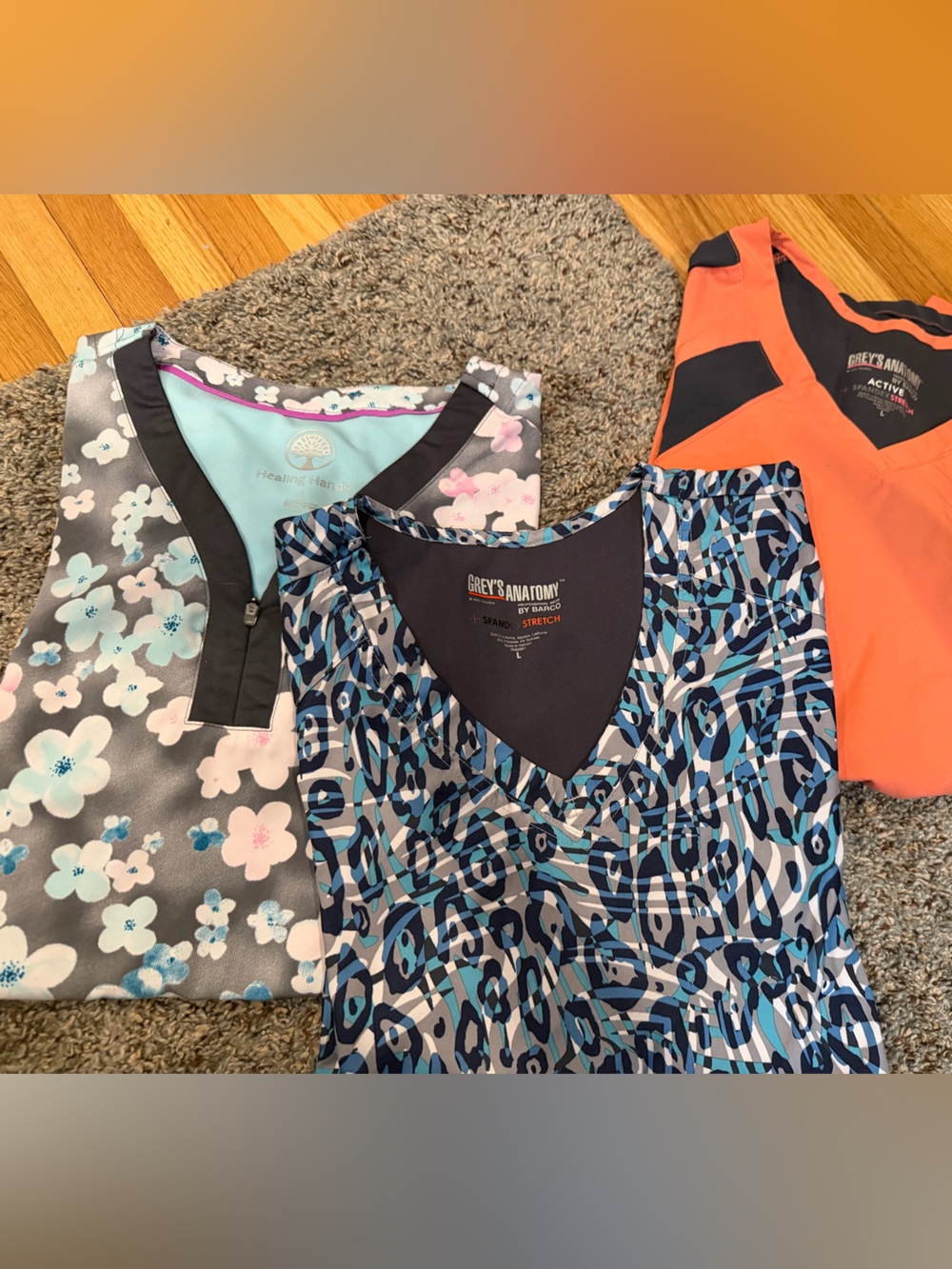 Three Women's Medical Scrub Tops - Floral, Abstract Blue, Coral